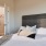 a couple of beds in a hotel room