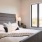 a bed with a large window