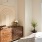 a bedroom with a large window