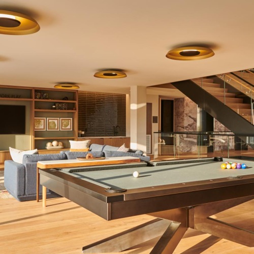 A perfect fit for the whole family a pool table in a room